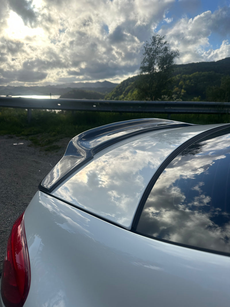 KONG Carbon Ducktail Spoiler CLS W218 side – Kong Performance