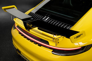 Techart Porsche 992 Carrera Rear Spoiler II — racing yellow bakperspektiv