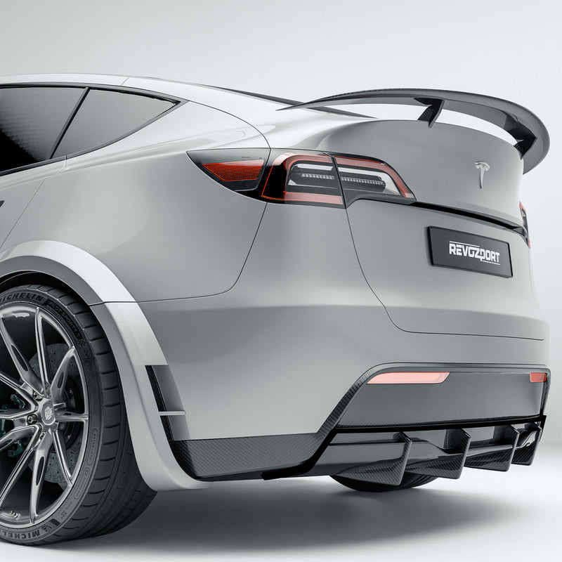 Tesla Model Y 21-24 with a carbon fiber rear diffuser on a white background