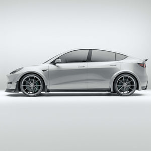 Tesla Model Y 21-24 with a carbon fiber wheel cover on a white background